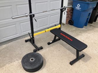 Adjustable Rack With 2 45lb Rubber Bumper Plates And Weirder Bench