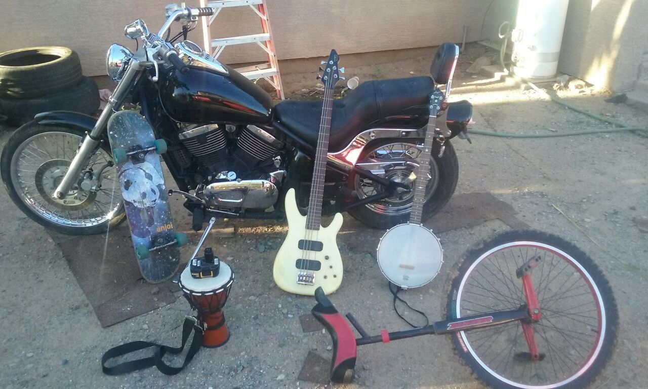 Kawasaki vulcan, westone bass guitar,saga bajo,skateboard, dewalt battery,unicycle