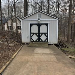 TWO EXTERIOR Sheds FREE WILL SALE  SEPARATELY. Do You Want The One With The Drive Way In Front Of Of It? 