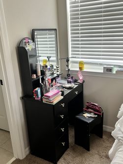 black vanity with light 