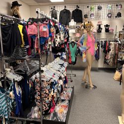 Hundreds of name brand Bikini Swimsuits In stock! XS to 5x. 