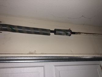 GARAGE DOOR SPRING / RESORTES