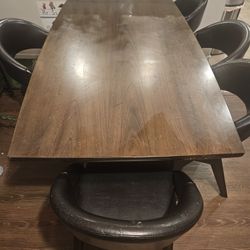 Large Wooden Dining table. With 6 Leather  Chairs