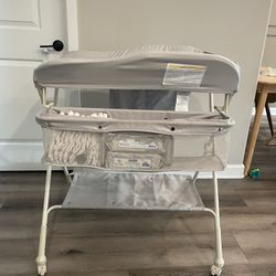 Compact Foldable Changing Table On Wheels 