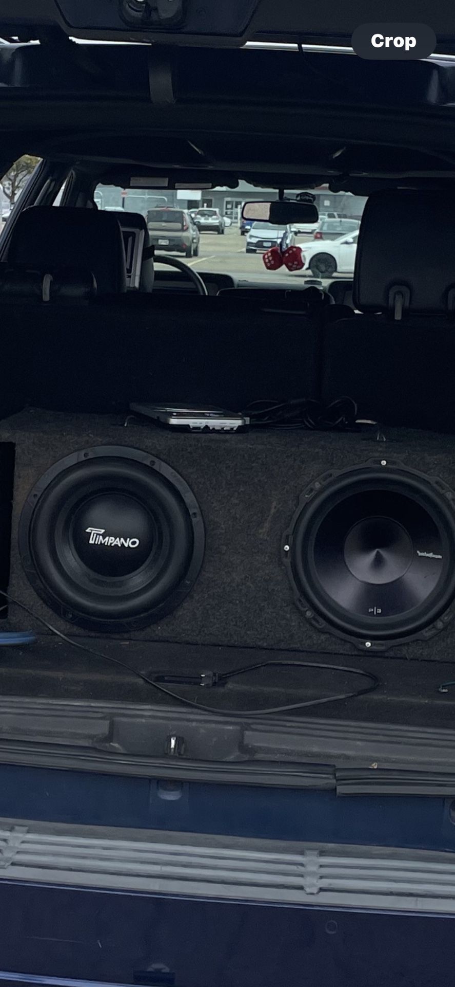 A Pair Of Non-Matching 12 Inch Subwoofers And 1500 W Amp