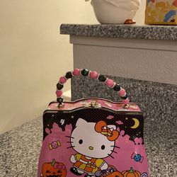 hello kitty tin purse