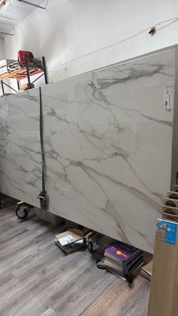 Porcelana slabs size 62X126 thick1/2” solo dos slabs  $1000 por los dos 3120 Paseo Mercado suit 106 puedes venir a verlos
