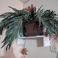 Fake small house plant plastic plant.