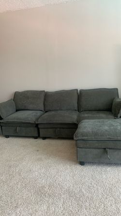 Green couch with storage