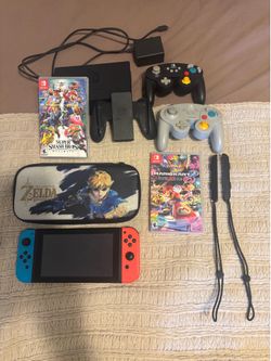 Nintendo Switch Bundle – 2 Games (Smash & Mario Kart) + GameCube Controllers & Case!