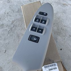 Gray Driver Side Door Lock and Side Window Switch