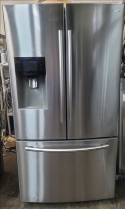 Samsung 26 cubic foot refrigerator with water and ice
