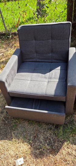 2 arm chairs that convert to a bed.
