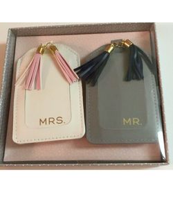 Brand new luggage tag  both $15