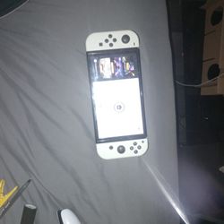 Nintendo Switch OLED. 4 Games. 128mb Card. Carry Case