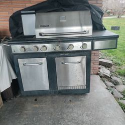 Nexgrill 4 burner stainless steel propane gas grill with refrigerator