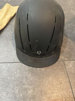 Riding Helmets And Outfits 