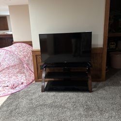 50” Roku Tv And Nice Heavy Duty Tv Stand 