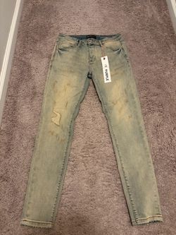 Rust washed purple jeans