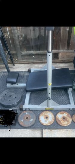 Vertical leg press with weights