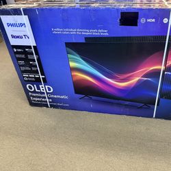 65. Tv. Oled Phillips smart 4K HDTV $55 down on financing free delivery six month warranty.
