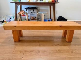 Handmade solid wood bench:  55 inches long,  14 inches high, 12 inches wide,  3.5-inch thick plank—