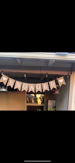 Engagement banner sign for party celebration white letters with brown