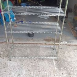 STAINLESS STEEL STORAGE RACK. HEAVY DUTY GAUGE WIRE INDOOR OUTDOOR