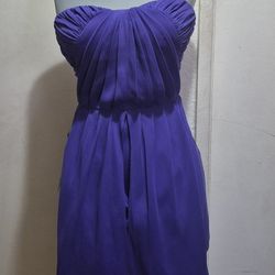 WOMAN BEBE PURPLE DRESS SIZE 0. NWT.