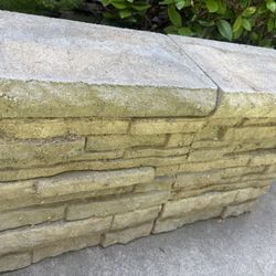 45 Ft OF CEMENT BORDERS AND TOPPER  MAKE OFFER 