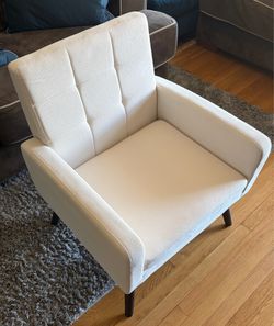 Cream colored armchair