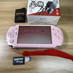 Pink PSP 3000 Console with 100 games installed.         N71