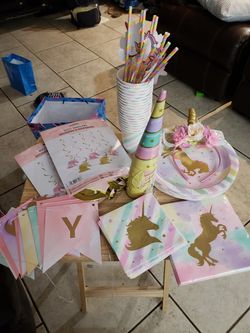 Unicorn theme decorations and lots of supplies