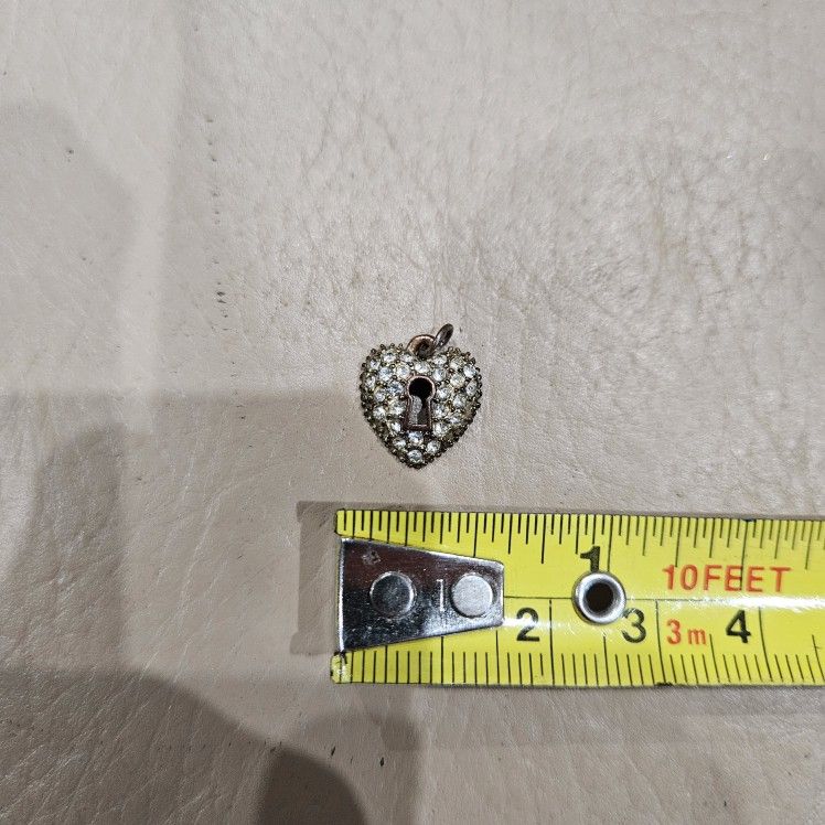 Tiny Heart Shaped Charm With Diamonds And Keyhole