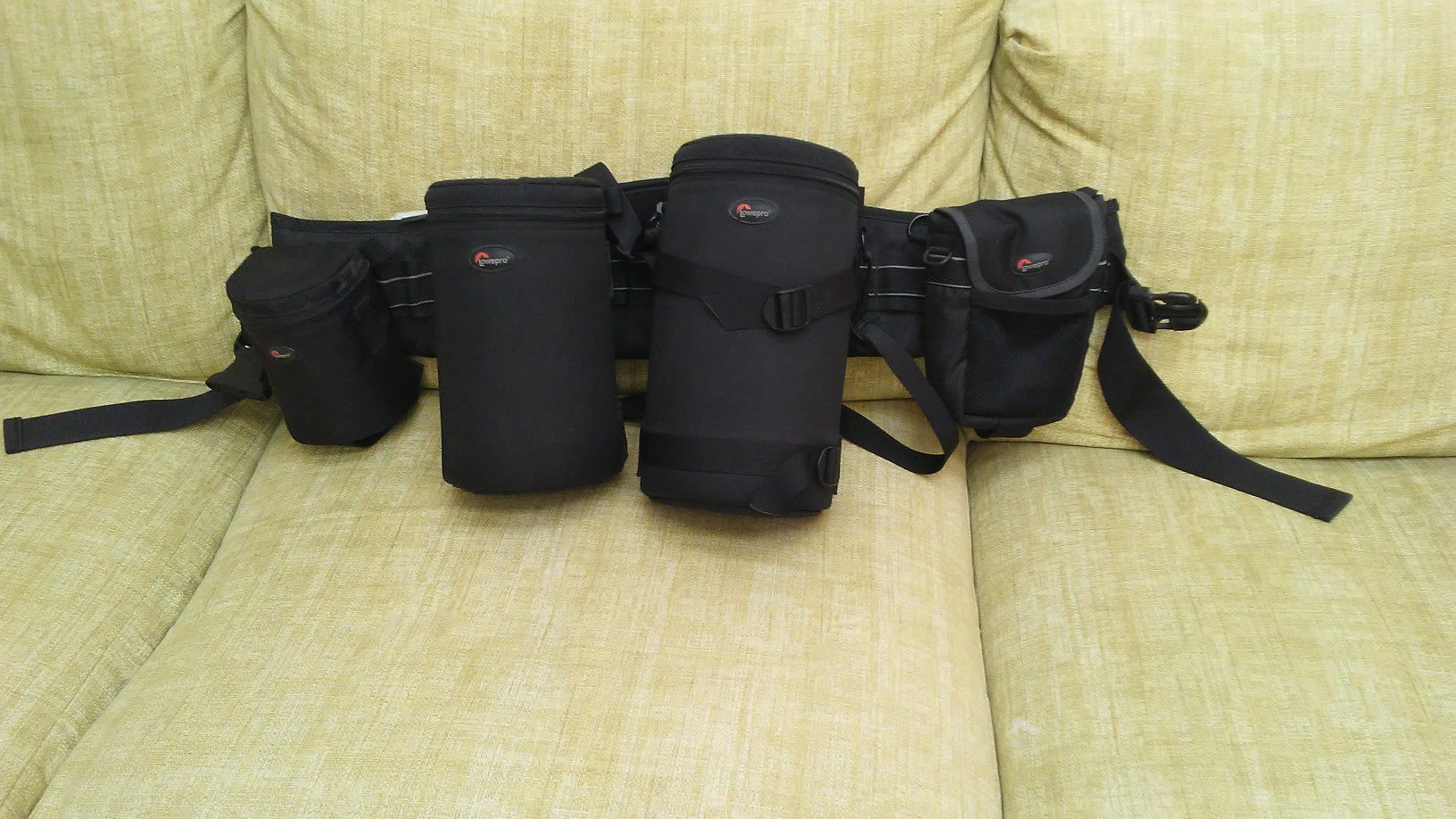 Never used lens and flash ( or other accessory ) pouches with belt.