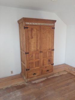nice dresser with a desk