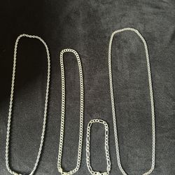 Silver Chains, Bracelet, And Coins