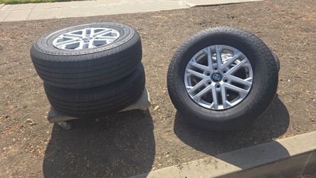 Toyota OEM Wheels with Bridgestone Tires Set of 4