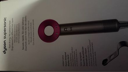 New Dyson Supersonic Hair Dryer with stand and attachments