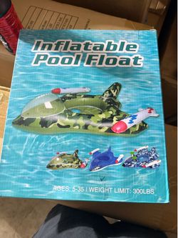 Floaty with built-in water gun
