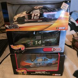 NASCAR CARS Mattel under the Hot Wheels Racing brand. 
Top: 2003 Ryan Newman #12 Speedpass car. 
Middle: 2003 Kyle Petty #45 Conseco car 