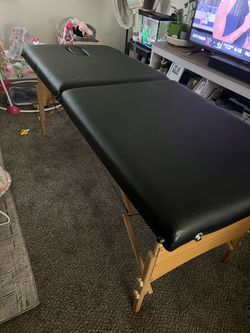 Massage table