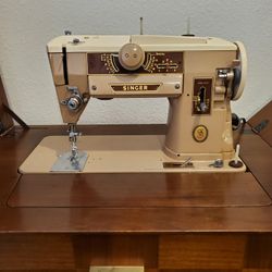 Singer Sewing Machine with Cabinet 