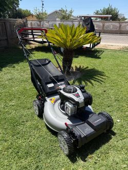 Murray 22 in. 140 cc Briggs & Stratton Walk Behind Gas Self-Propelled Lawn Mower with Front Wheel Drive and Bagger