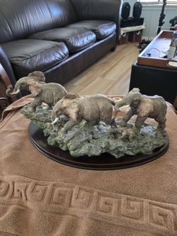 Beautiful, vintage Lenox African Elephant family sculpture titled "Playful Promenade," originally released in 2000.