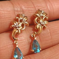14 k Gold Aqua Marine Stone with genuine diamonds