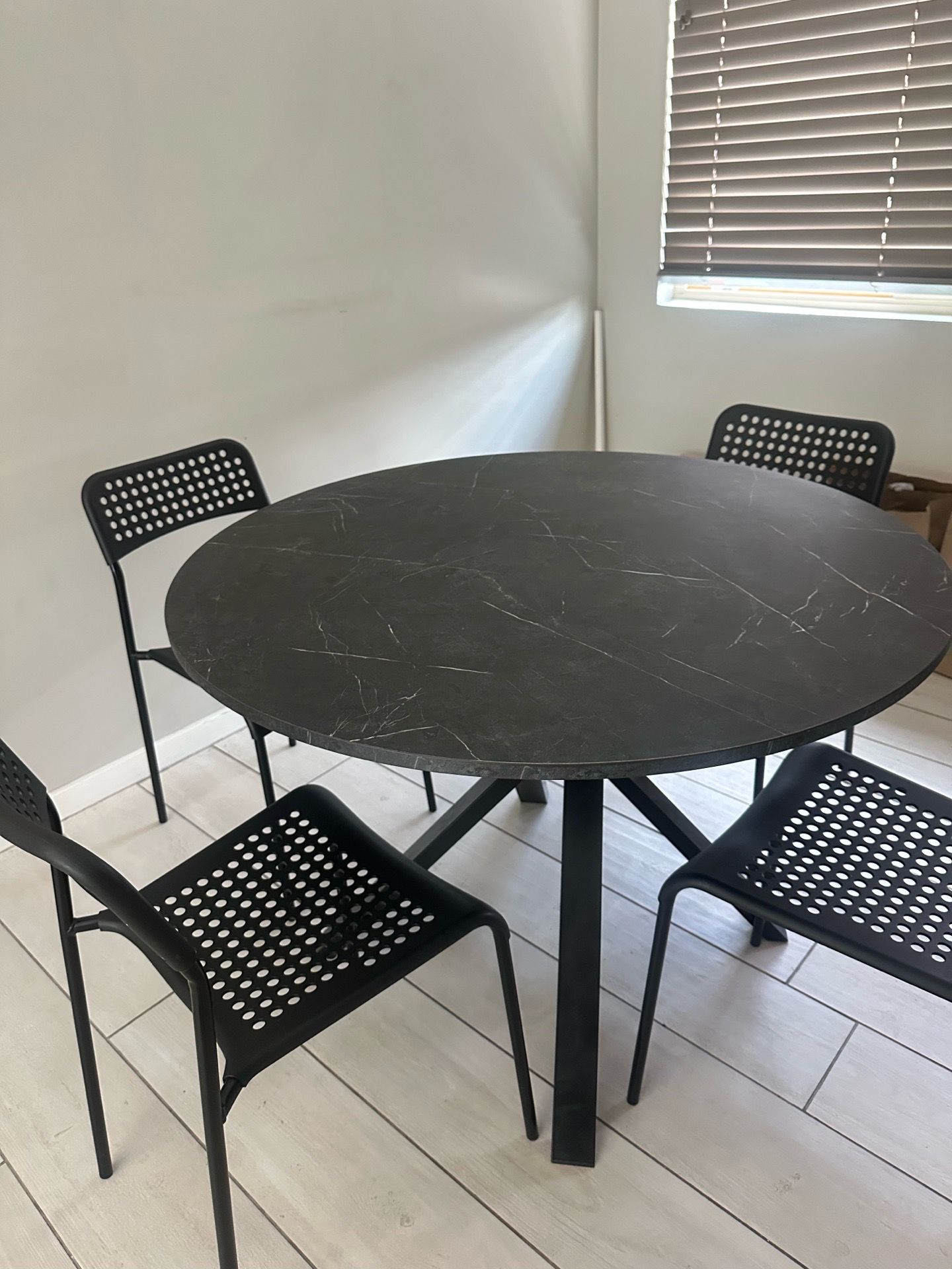 Black Marble Circle Dining Table (+ chairs)