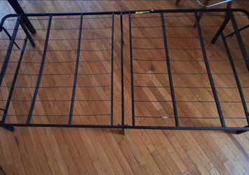 Portable twin size mattress bed rail.