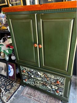Vintage green smaller armoire with 2 doors 2 drawers woodland cottagecore wallpaper accents