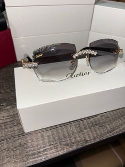 Cartier glasses black buffalo